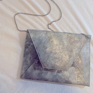 3/$15: Silver clutch bag with chain